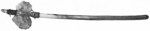 Swift Creek villagers preferred these roughly chipped axes to ones of ground stone. Many are too light for real chopping and may have been weapons, kitchen tools, or even digging implements. Length, 22 inches.