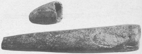 Straight tubes of steatite or soapstone are the earliest known form of pipe. They probably belonged only to shamans or medicine men. These come from north Georgia. Lengths, 2 inches and 11 inches.