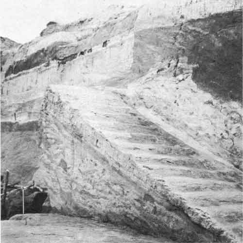 Fourteen clay steps, buried under later mound construction, led up the west slope of the earliest funeral mound to its summit.