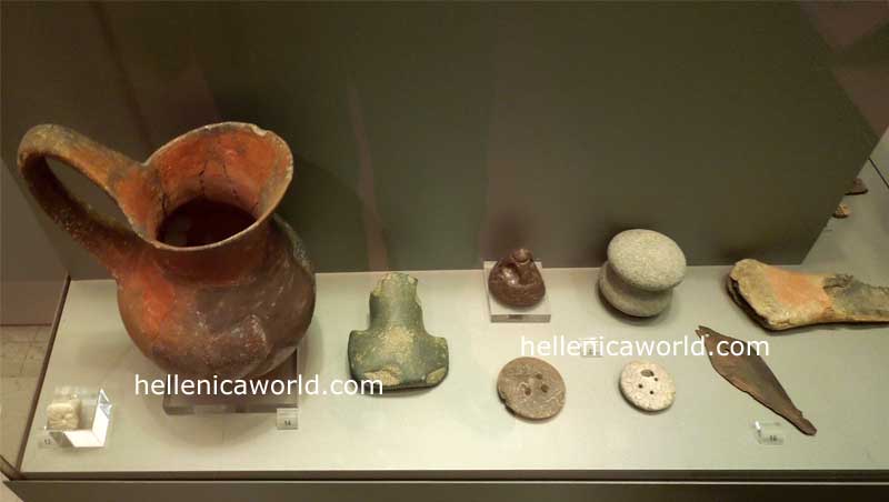 Clay jug, stone hammers and weights for fishing nets, bronze