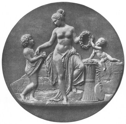 Bas-relief of a woman with two children