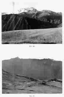 Fig. 44—The snow-capped Cordillera Vilcapampa north of Yucay and the upper canyon of the Urubamba from the wheat fields near Chinchero. In the foreground is one of the well-graded mature slopes of Fig. 123. The crests of the mountains lie along the axis of a granite intrusion. The extent of the snowfields is extraordinary in view of the low latitude, 13° S.