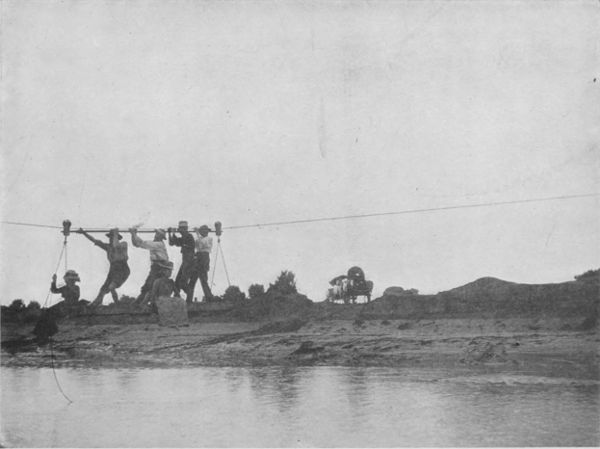 AN AËRIAL FERRY—PROSPECTORS CROSSING COLORADO RIVER