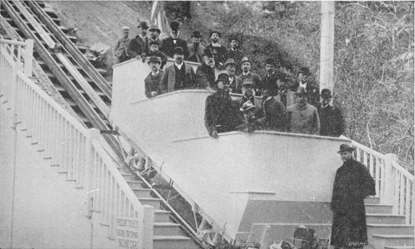 Hon. R. T. Lincoln, Marshall Field, and Other Distinguished Visitors in White Chariot of Great Cable Incline, Mount Lowe.