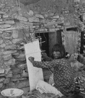 A Hopi, weaving a Native Cotton Ceremonial Kilt.