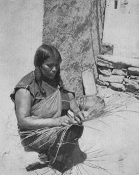 An Oraibi Basket Weaver.
