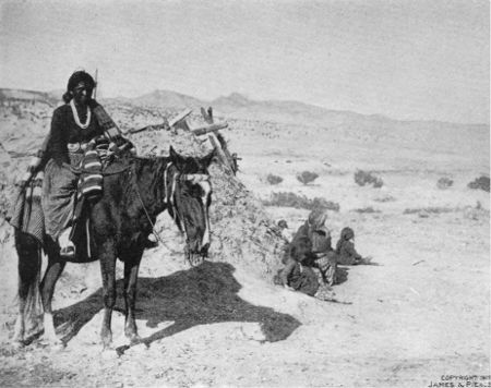 Navaho Woman on Horseback.