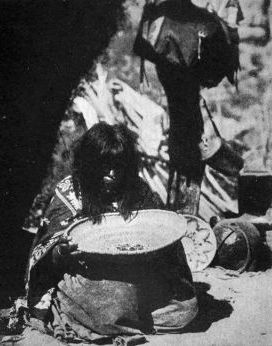 Chickapanagie's Wife, a Havasupai, parching Corn in Basket.